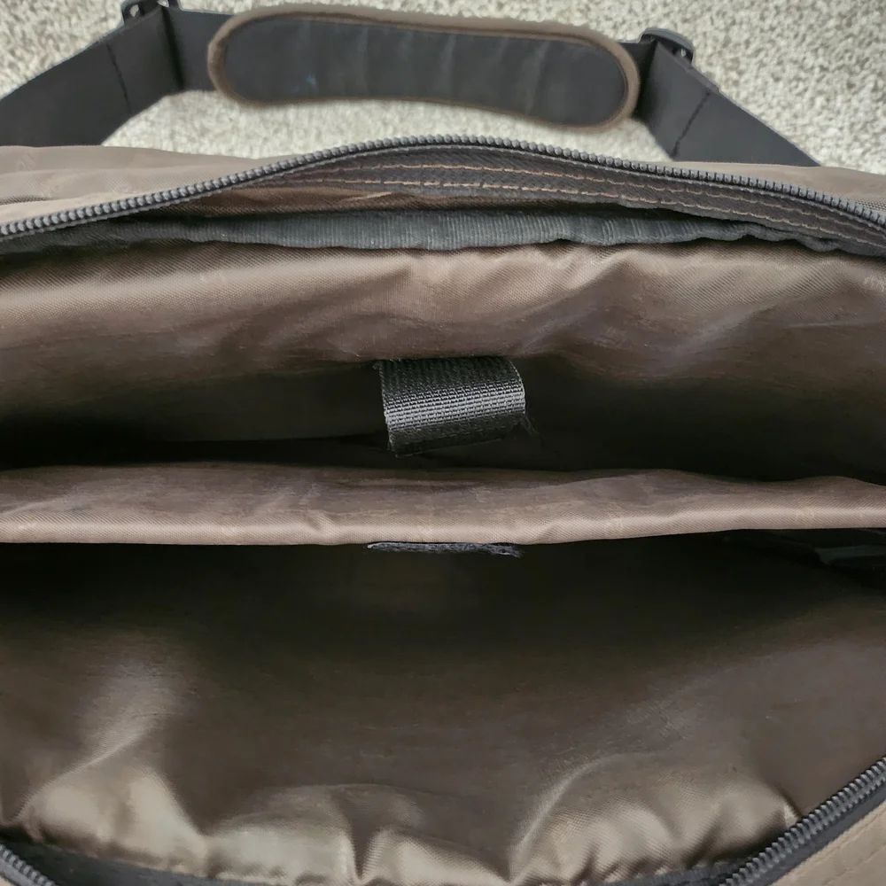 Eddie Bauer Brown Messenger Bag with Black Straps and Durable Fabric